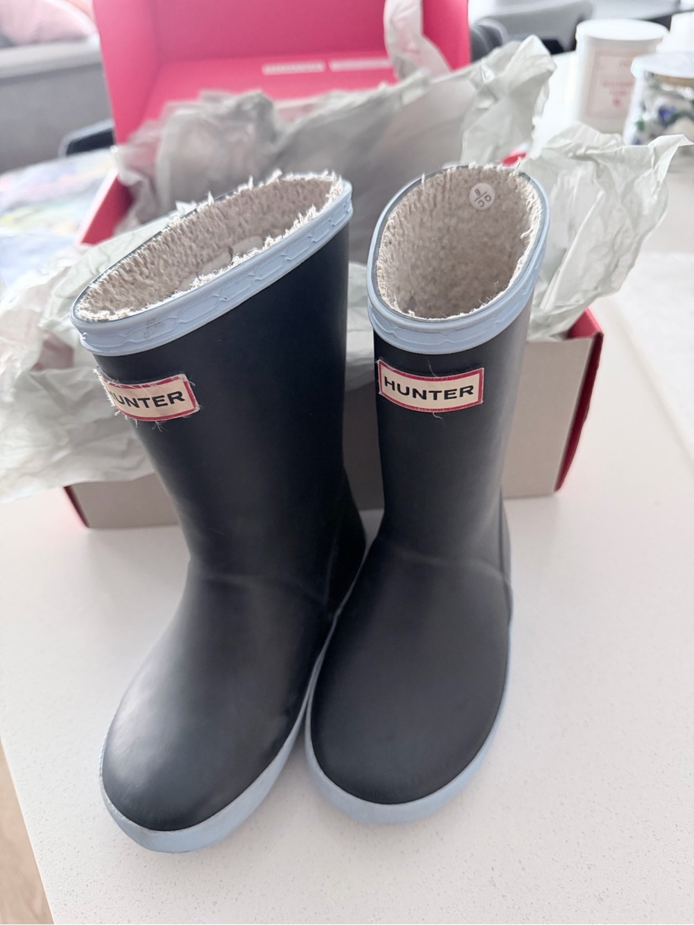 Hunter Kids Black Rain Boots with Light Blue Trim and Cozy Lining